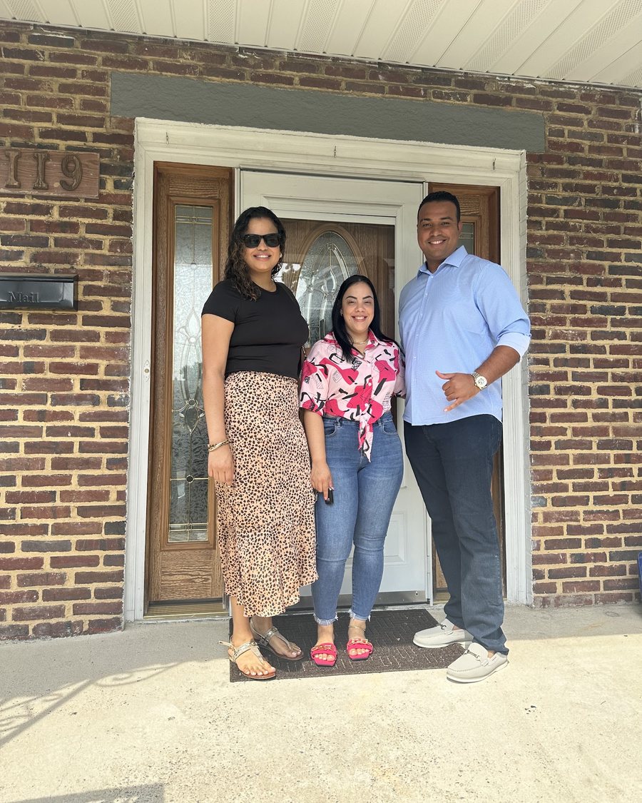 Cindy with her clients on closing day